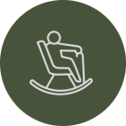 Person sitting in a rocking chair, depicted in a green circle