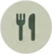 White plate with a fork and knife on it, set against a white background
