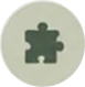 White button with a green puzzle piece in the center, set against a white background